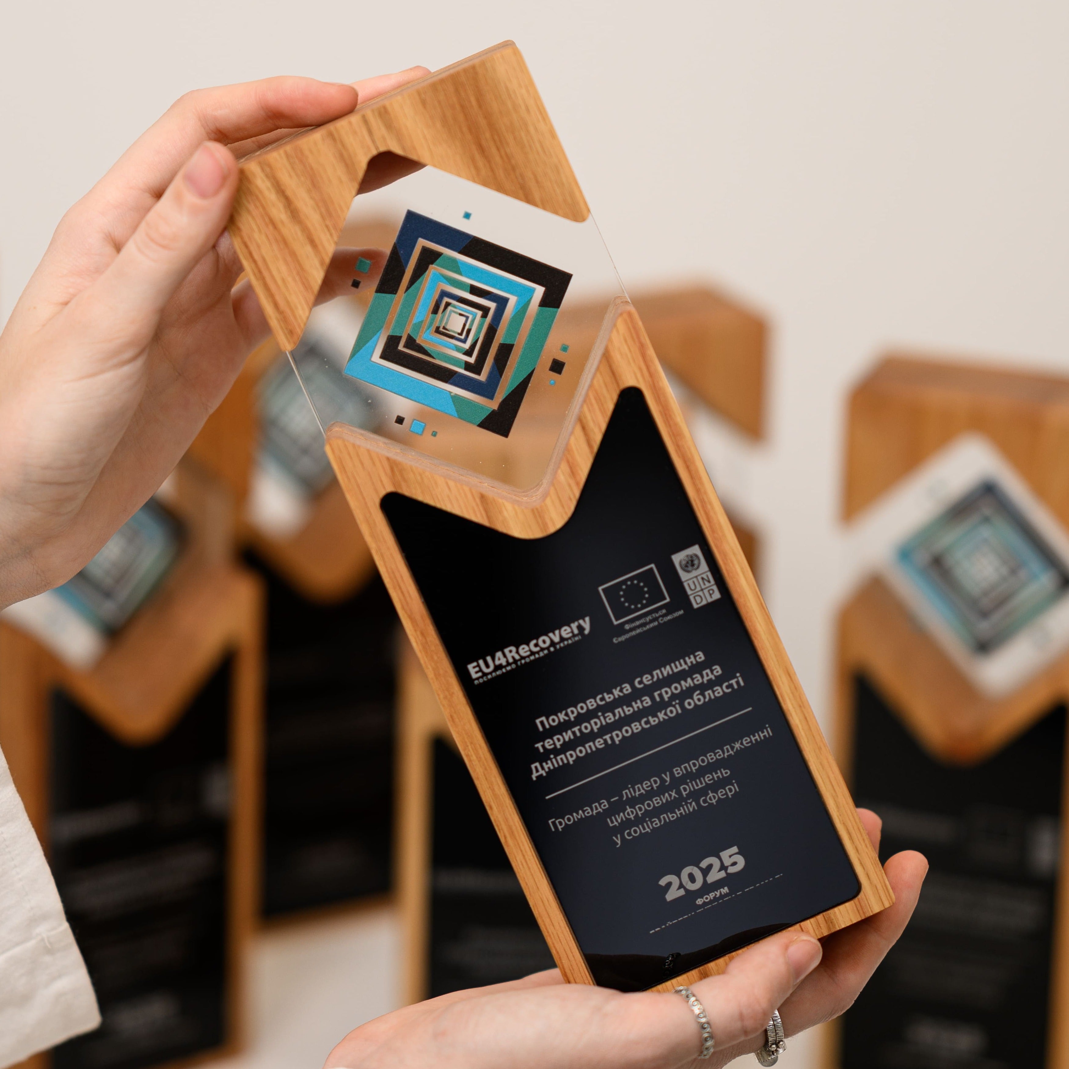 Awards for EU4Recovery Forum 2025 — Oak and Acrylic Design for UNDP Recognition Program