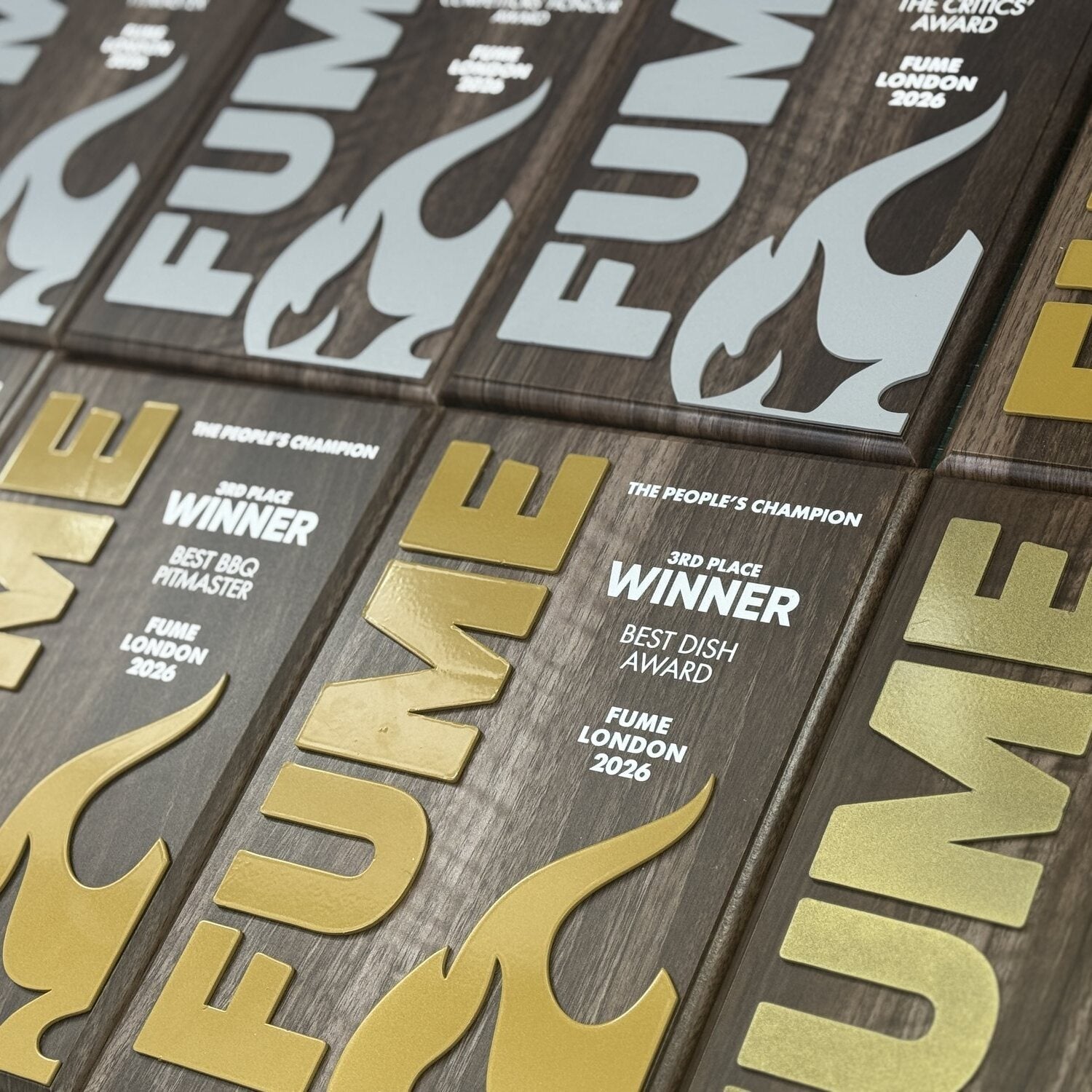 Custom BBQ Competition Awards & Trophies for FUME London 2026 — Wood, Painted Metal Flame Branding in Three Formats