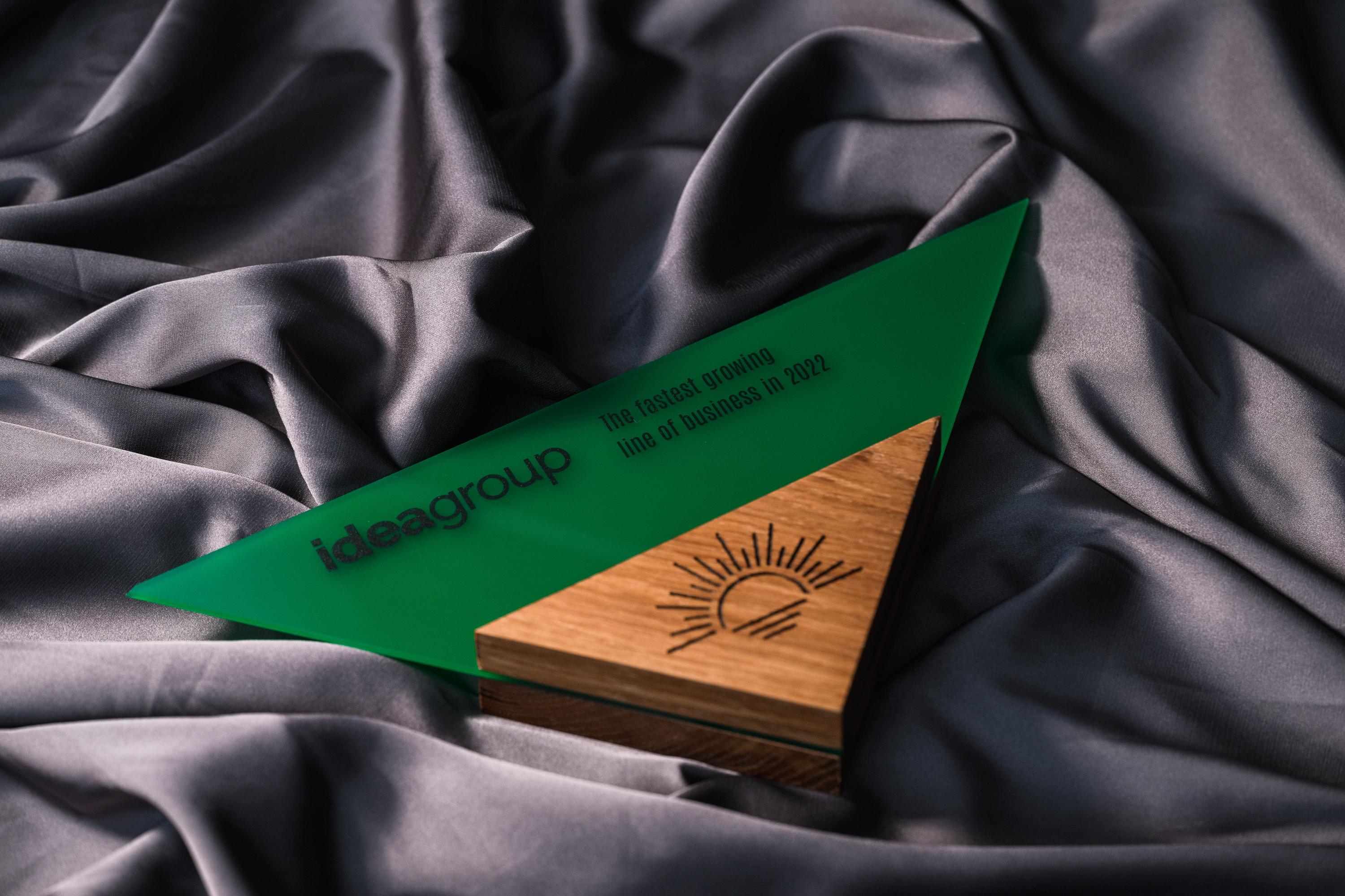 Wooden award with acrylic “Triangle”