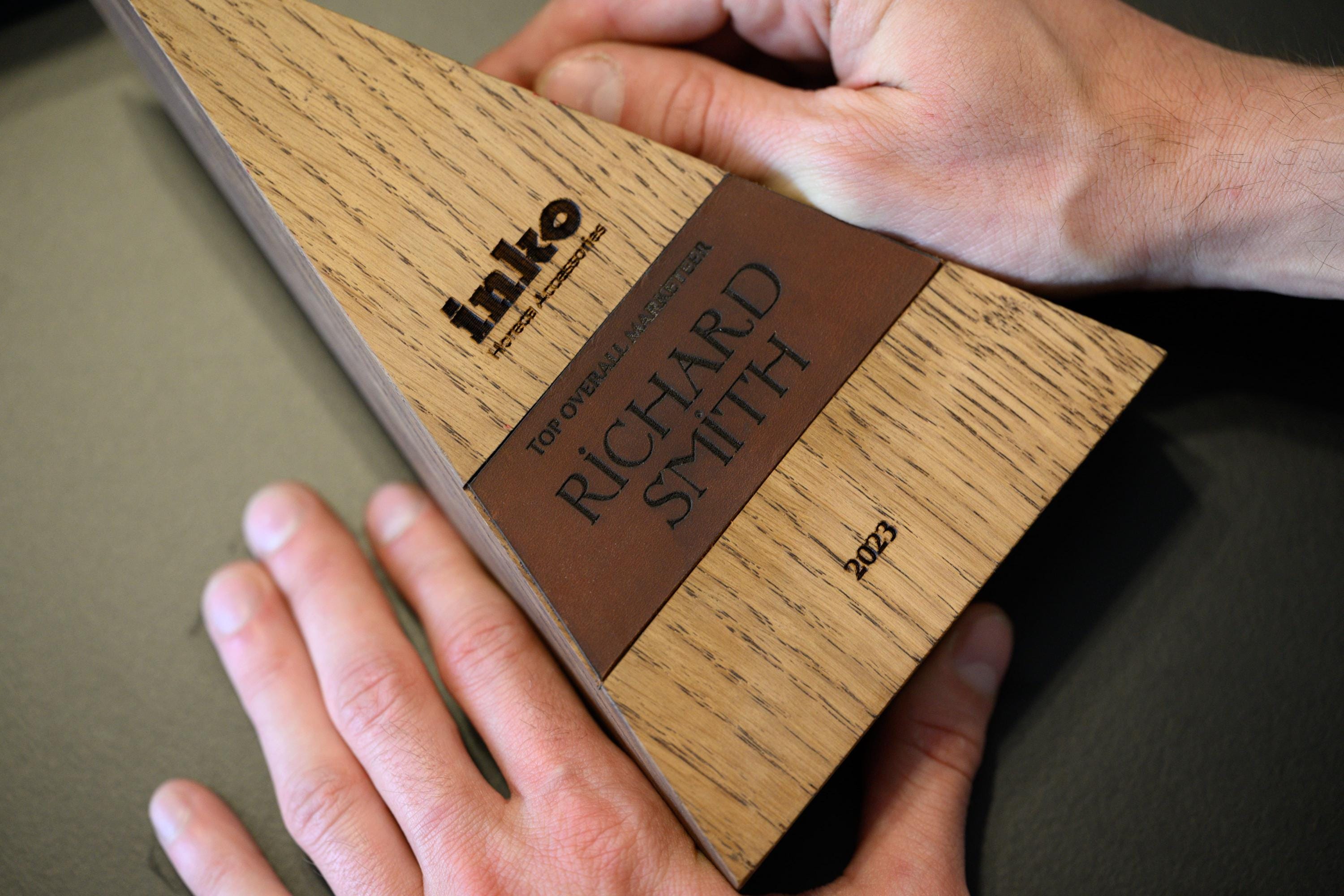 Wooden award with leather