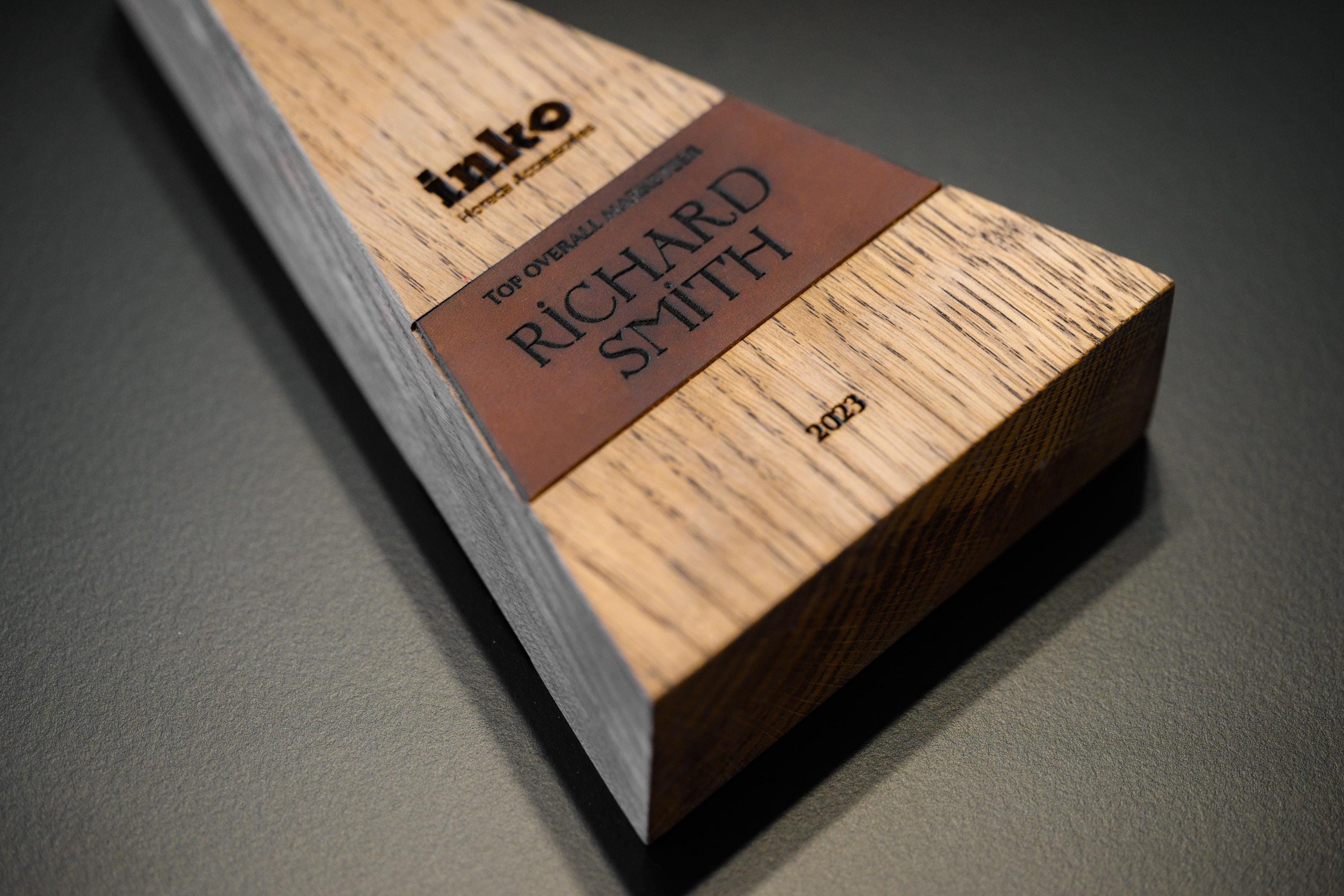 Wooden award with leather