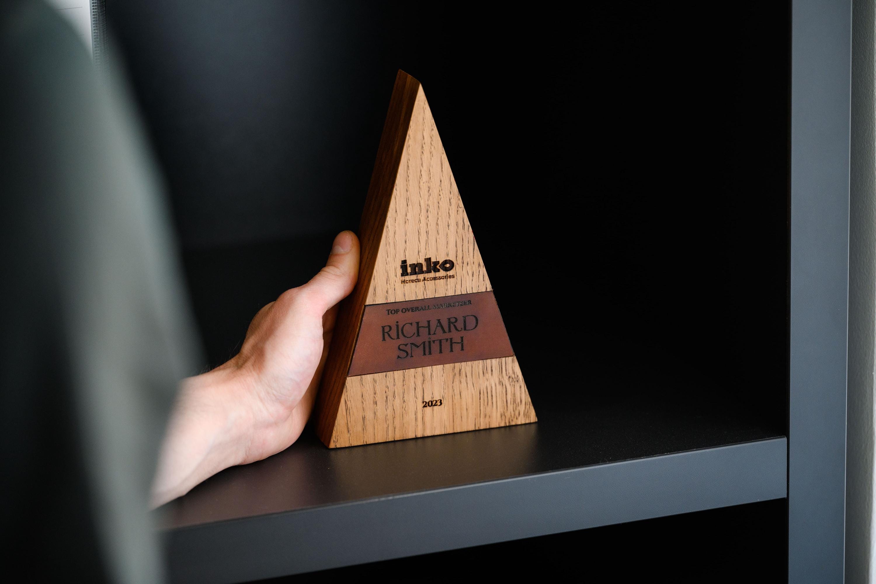 Wooden award with leather