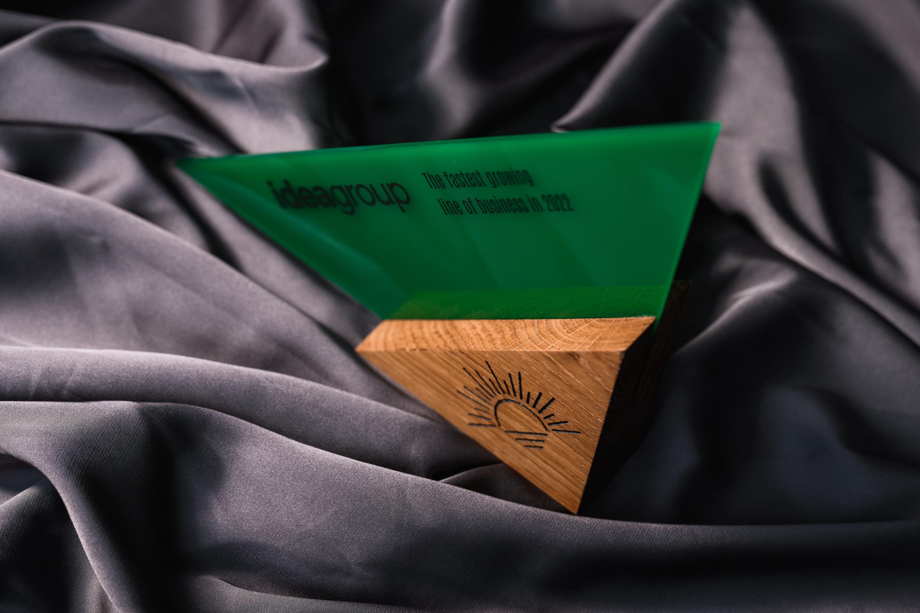 Wooden award with acrylic “Triangle”